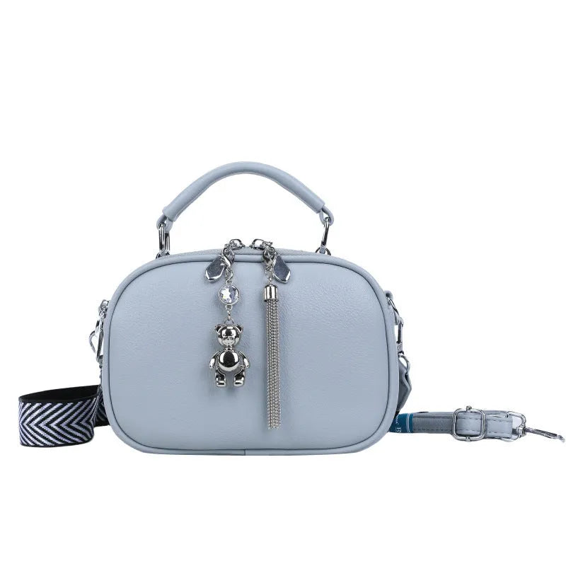 Women's stitching small square bag oval design showing mobile phone compartment and double shoulder straps