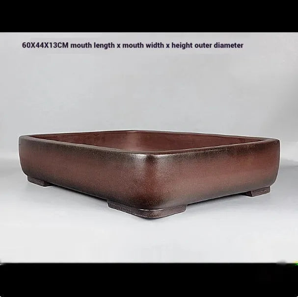 Handmade antique rectangular purple clay flower pot for tabletop or floor use.