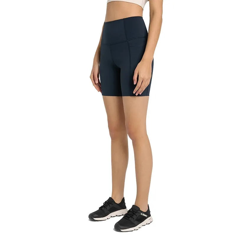 Women's tight-fitting super stretch sports shorts in grey lake green, short length for running.