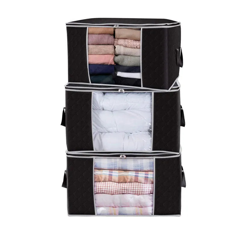 Beige non-woven storage bag with handbag shape for organising quilts and clothes in a wardrobe.