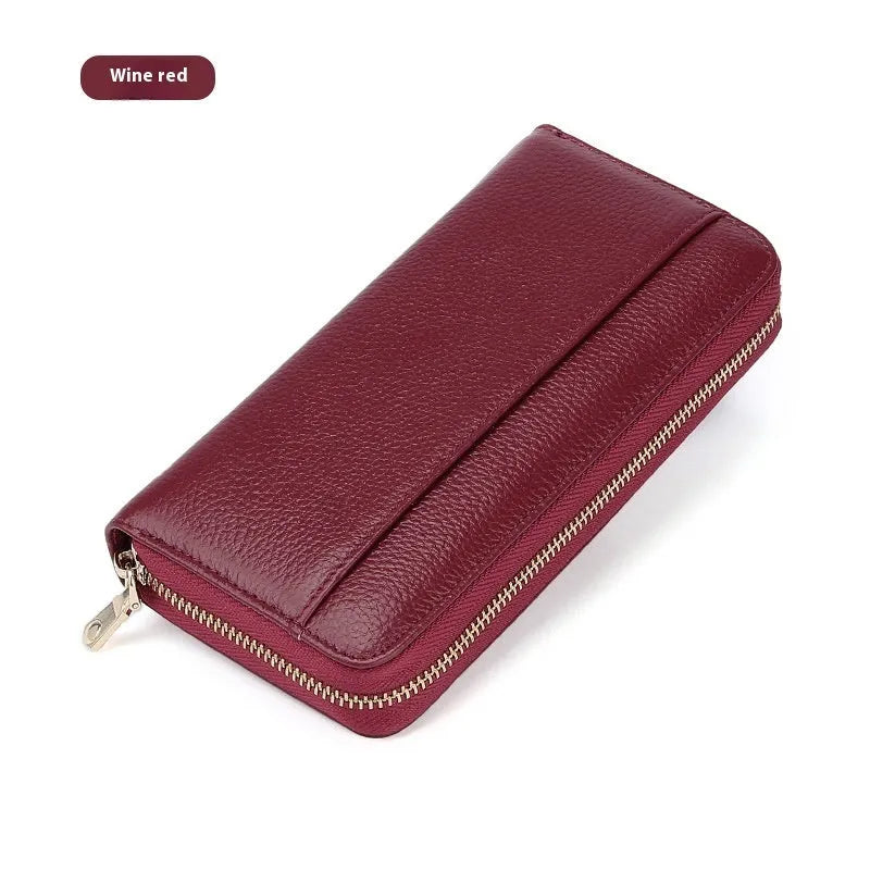 Long genuine leather women's wallet in solid colour with anti-theft card swiping feature
