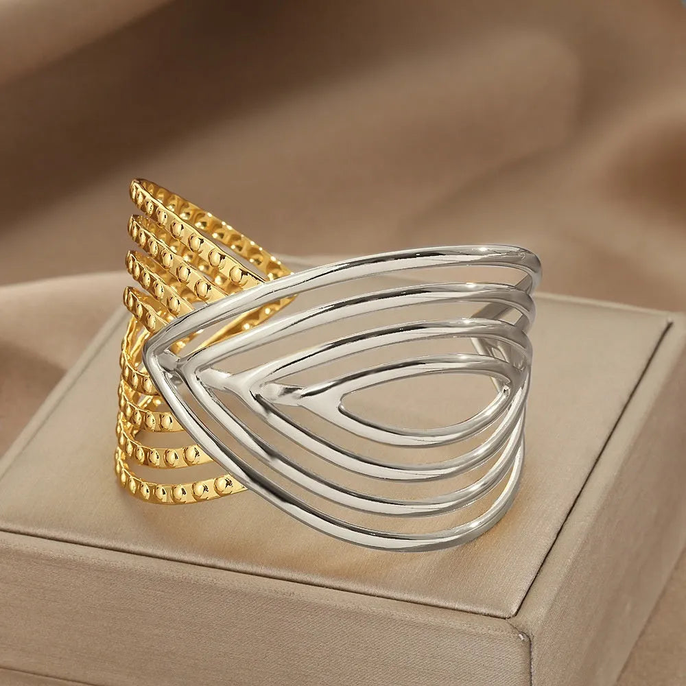 Stainless steel bracelet with lotus ring and glossy stripes, ellipse and line design, electroplated finish