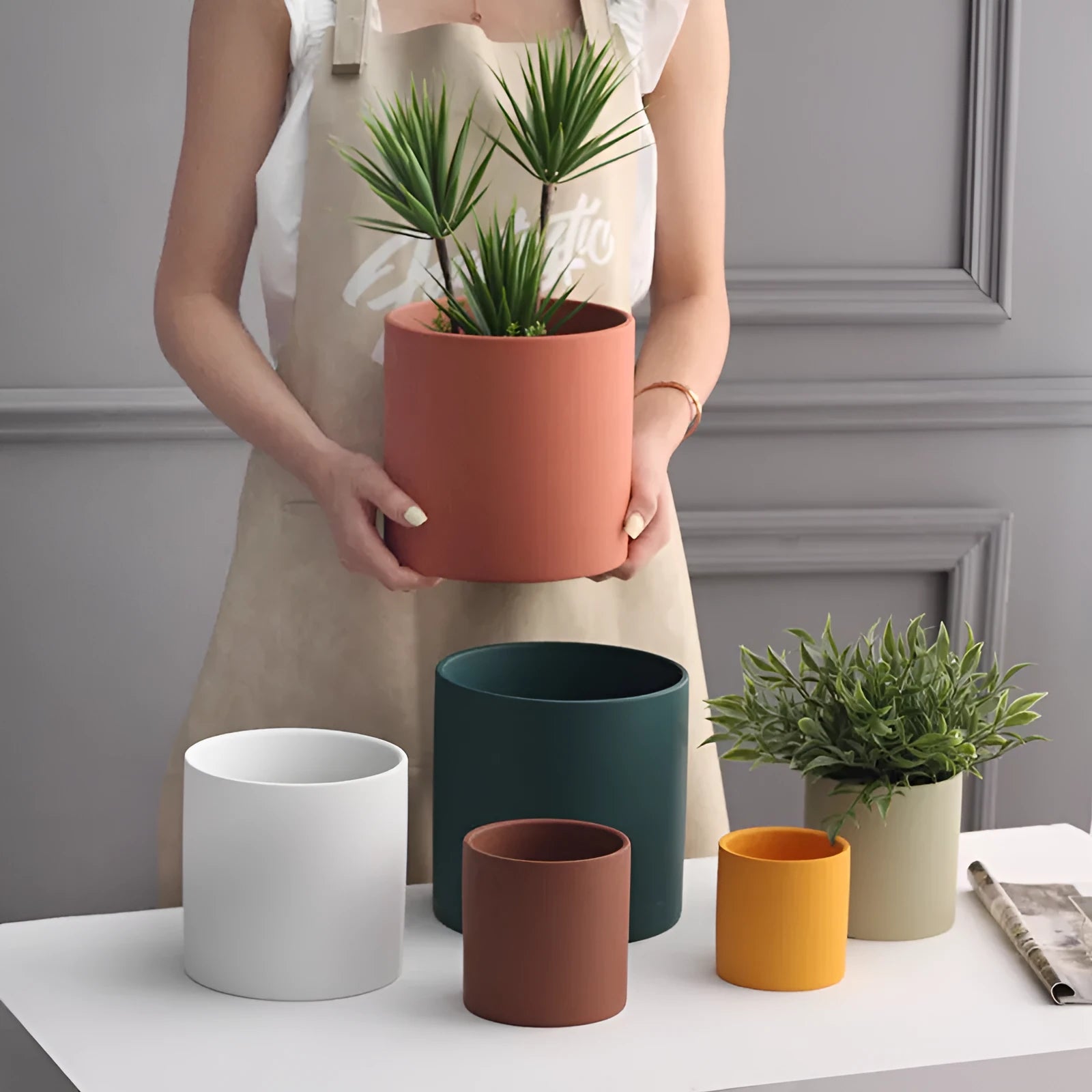 Cylindrical ceramic flowerpot with drainage hole in Nordic industrial style, suitable for succulents and green plants