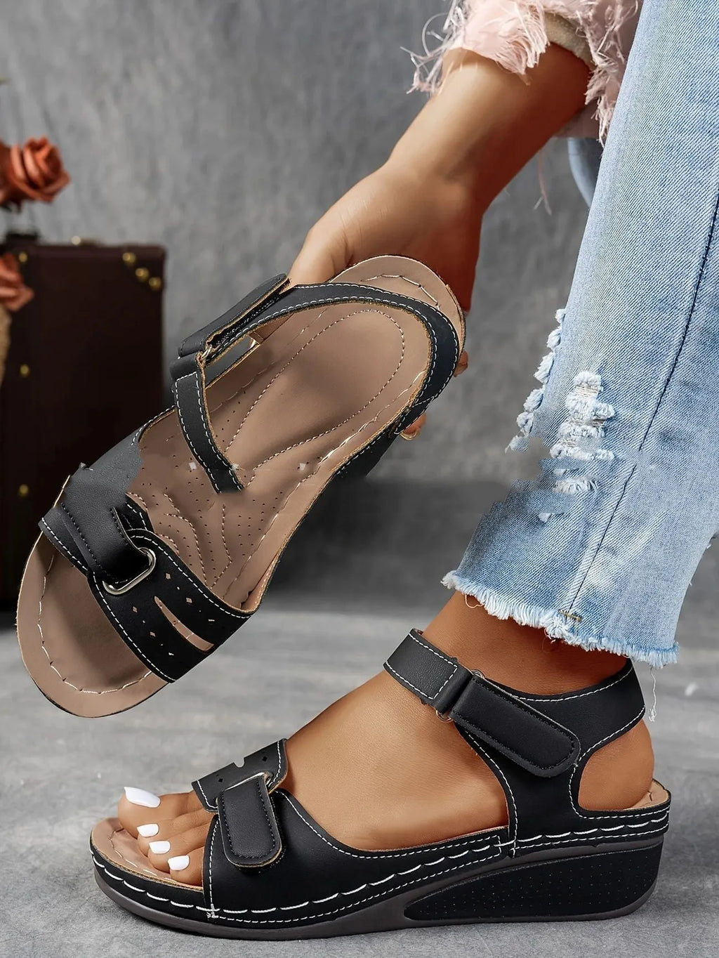 Women's beige strap sandals with thick composite sole and adjustable Velcro fastener on a white background.