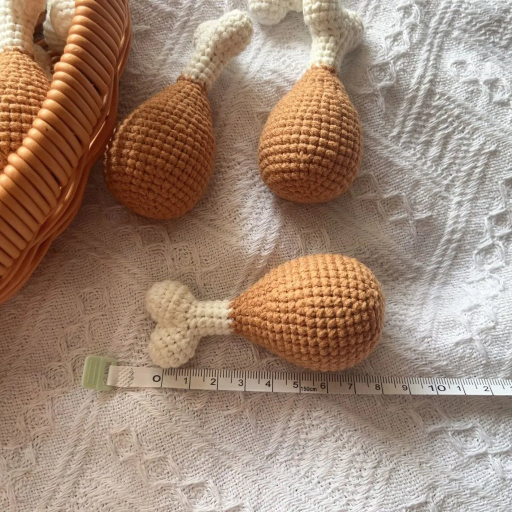 Crocheted plush chicken leg pendant key chain measuring 8cm in length.