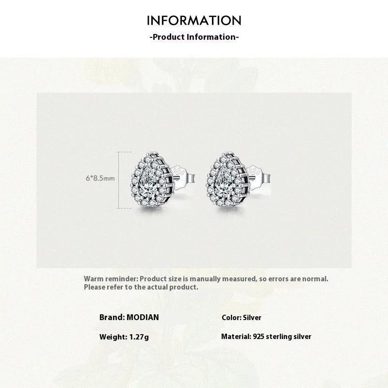 A pair of silver water drop shaped ear studs made from 925 sterling silver.