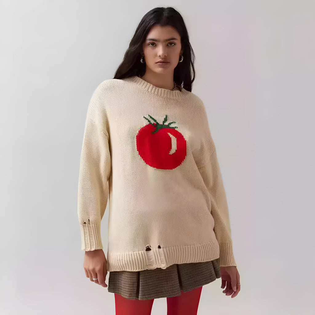 Women's loose-fitting milky white acrylic sweater with jacquard pattern and round neck.