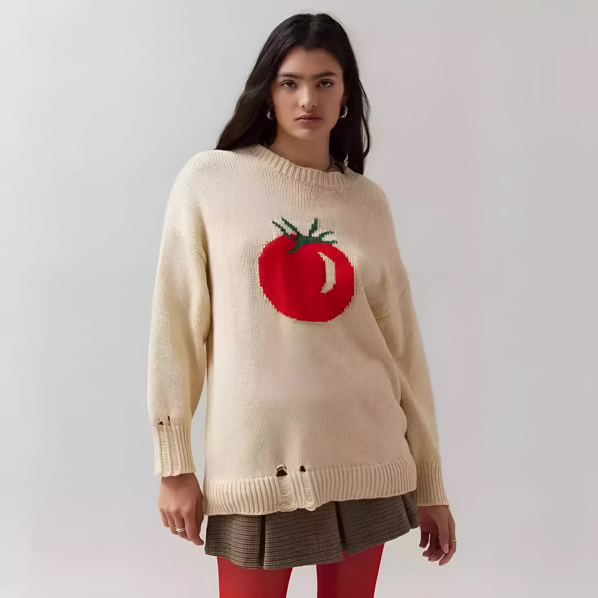 Women's loose-fitting milky white acrylic sweater with jacquard pattern and round neck.