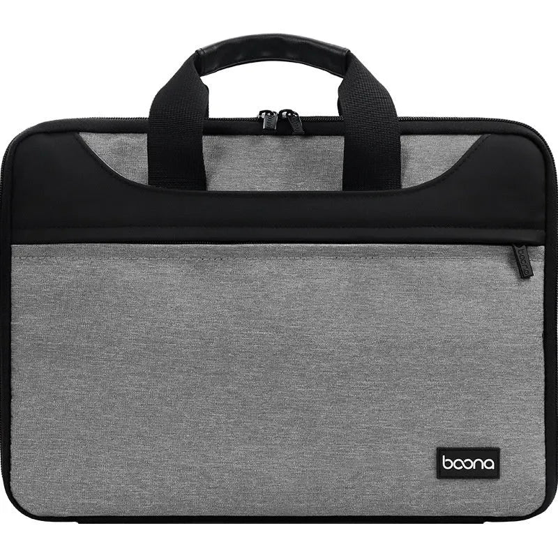 Black Oxford cloth laptop bag with soft carry handle, shown closed, for business travel.