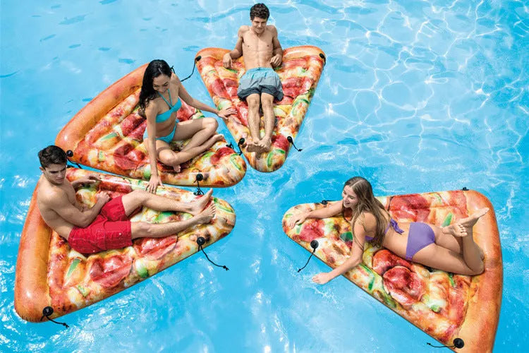 Large green pizza-shaped inflatable surfboard lounger floating on water