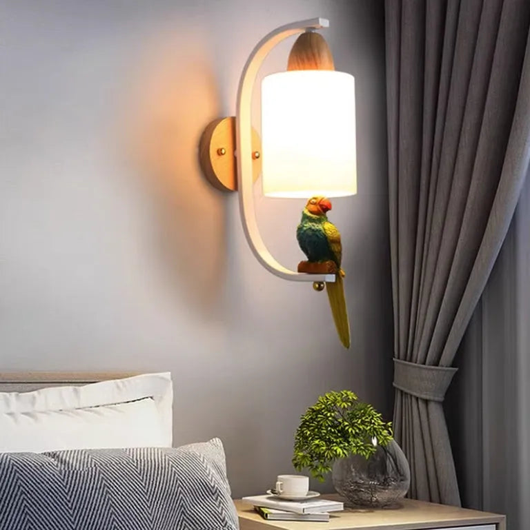 Solid wood and iron wall lamp with glass shade on a wall in a stairway