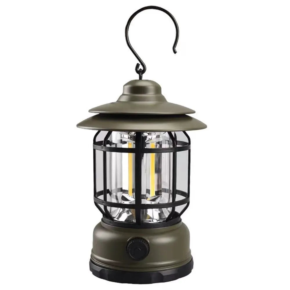 Dark green portable camping lantern with head strap, shown as a headlamp and standalone light for booths.