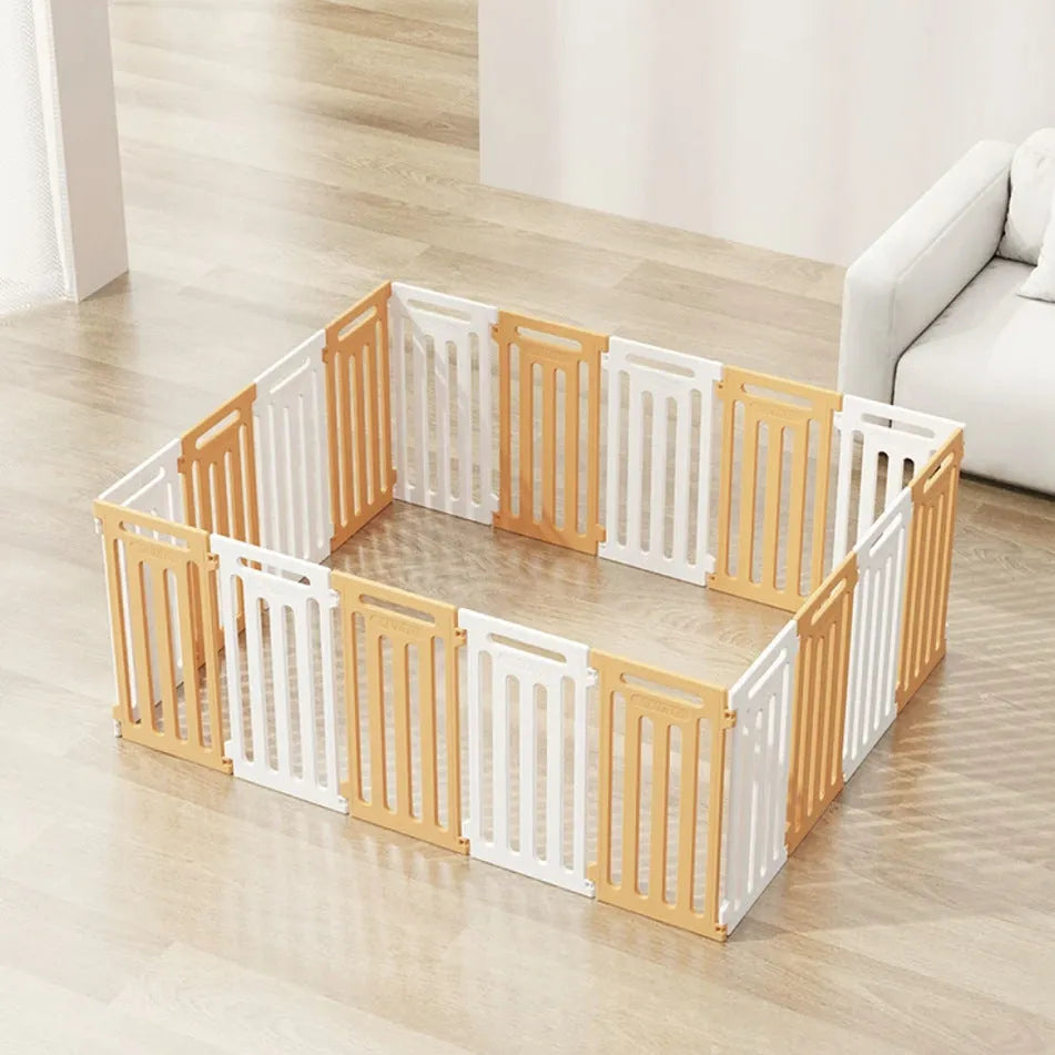 Plastic modular pet isolation fence panels assembled as indoor dog enclosure in white and green colour combination