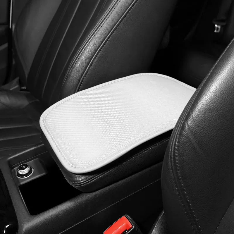 Leather car armrest box cushion mat in four colour options on a white background.