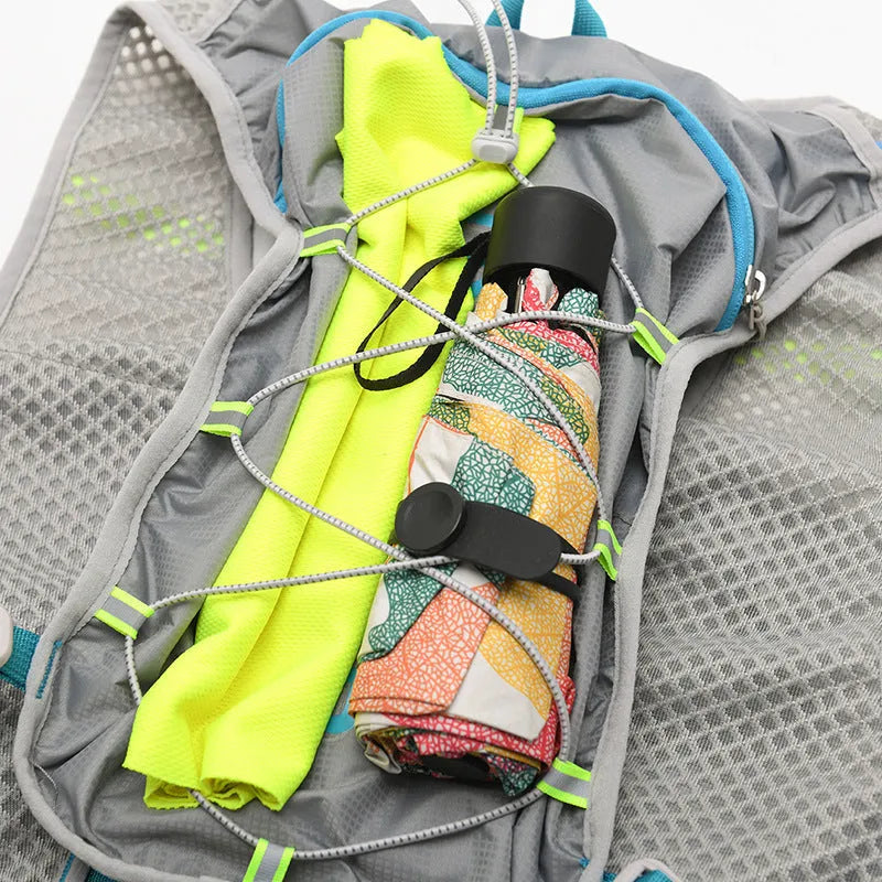 Nylon running backpack with reflective strips in black colour, showing front compartment and adjustable straps