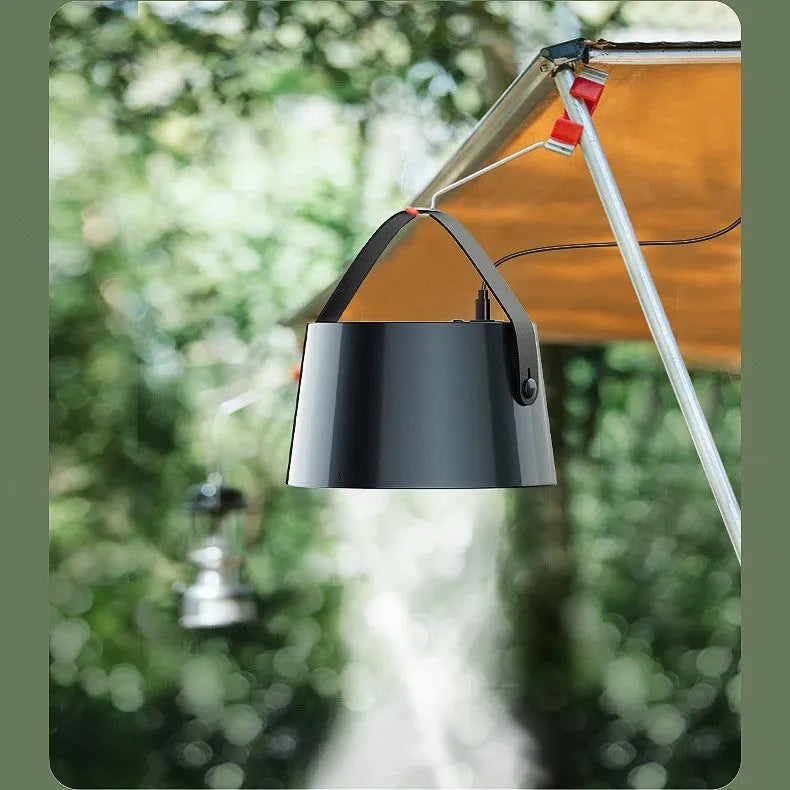 Milky white portable USB desktop exhaust fan with tripod stand and removable filter screen.