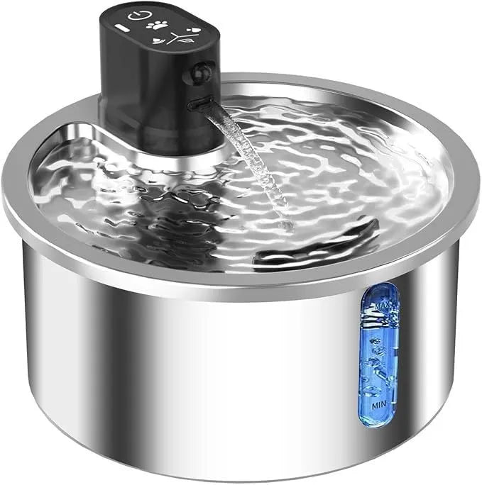 White ceramic pet water fountain with stainless steel dish and digital temperature control display.