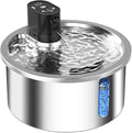 White ceramic pet water fountain with stainless steel dish and digital temperature control display.