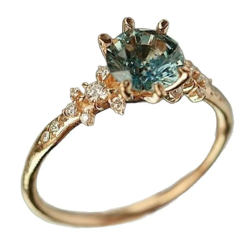 Gold plated geometric claw ring with square pattern and inlaid zircon stone.