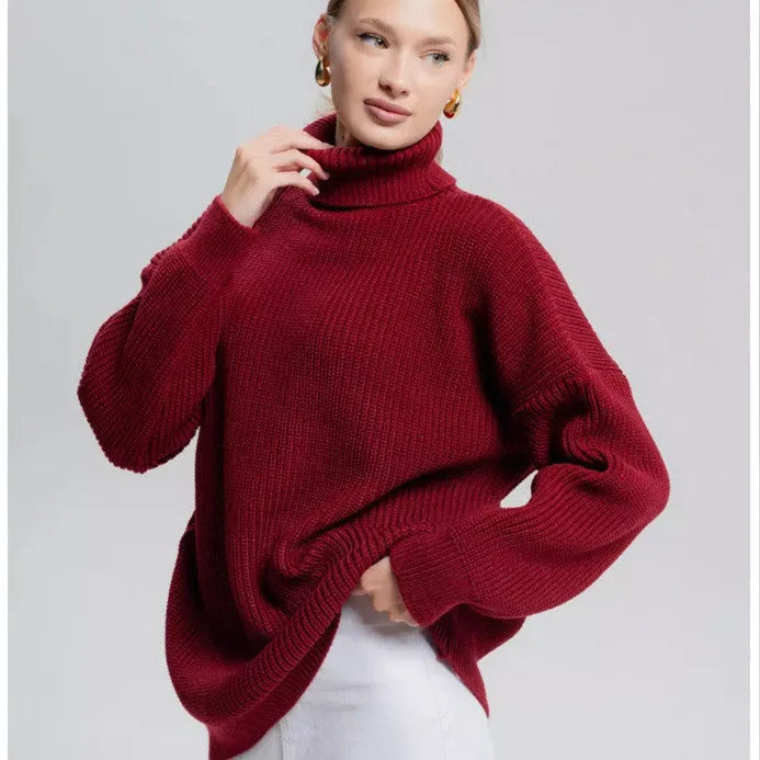 Women's solid colour high neck pullover sweater in imitation cashmere fabric on a hanger.