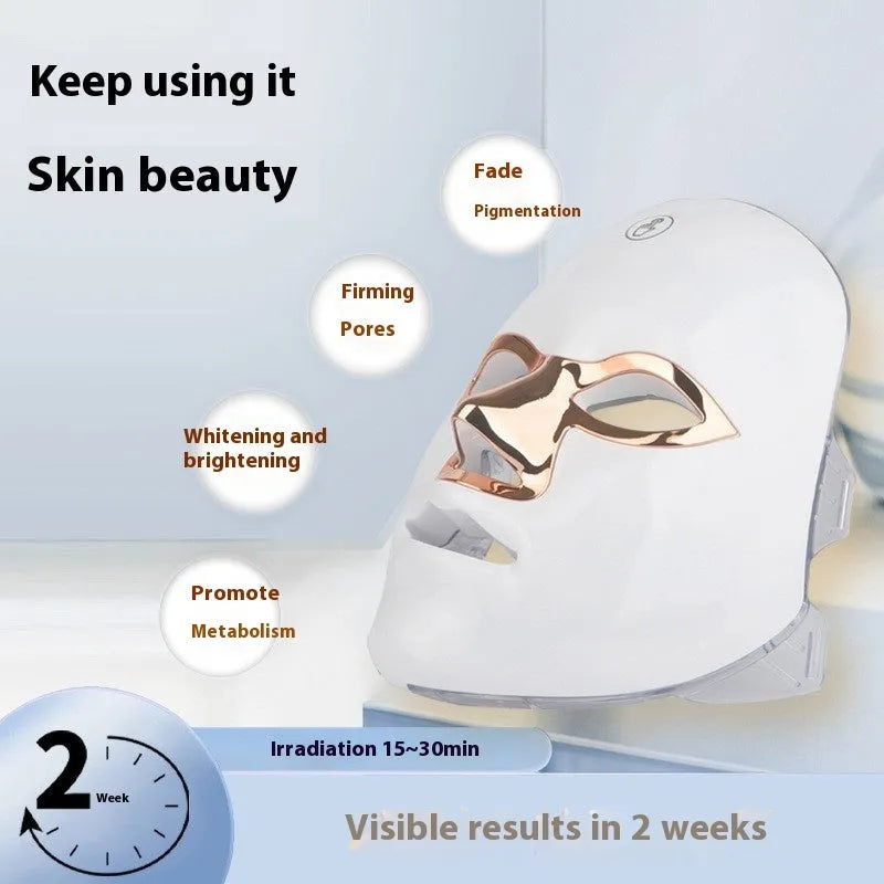 White gold rechargeable LED light therapy beauty mask with adjustable head strap.