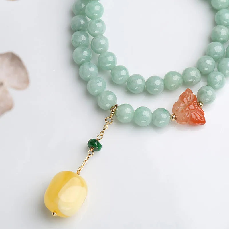 Double-layer women's bracelet with green jade round beads and beeswax barrel beads in retro design