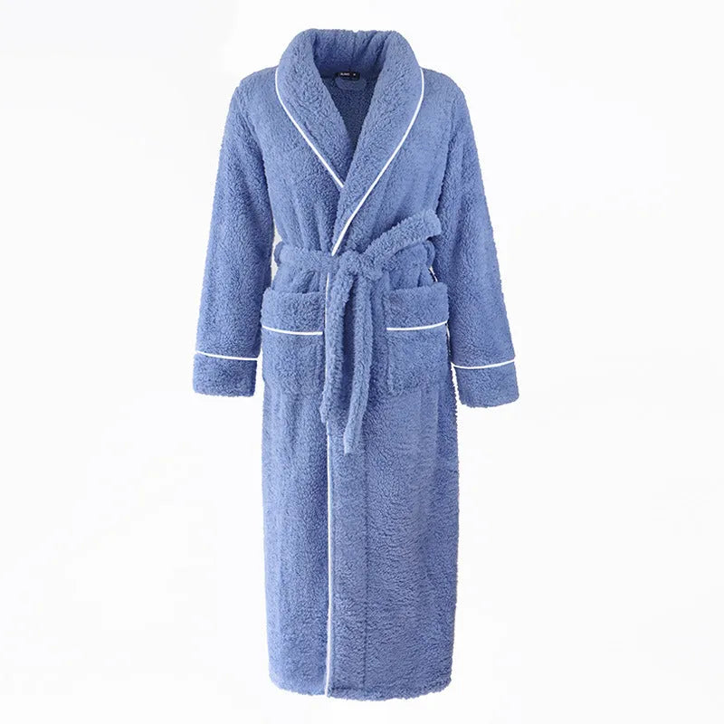Man and woman wearing matching thick navy blue flannel bathrobes, showcasing the couple's winter loungewear.