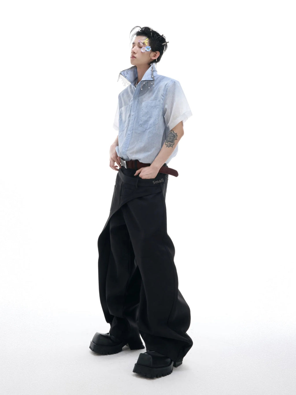 Blue loose fit short sleeve casual shirt on a hanger.