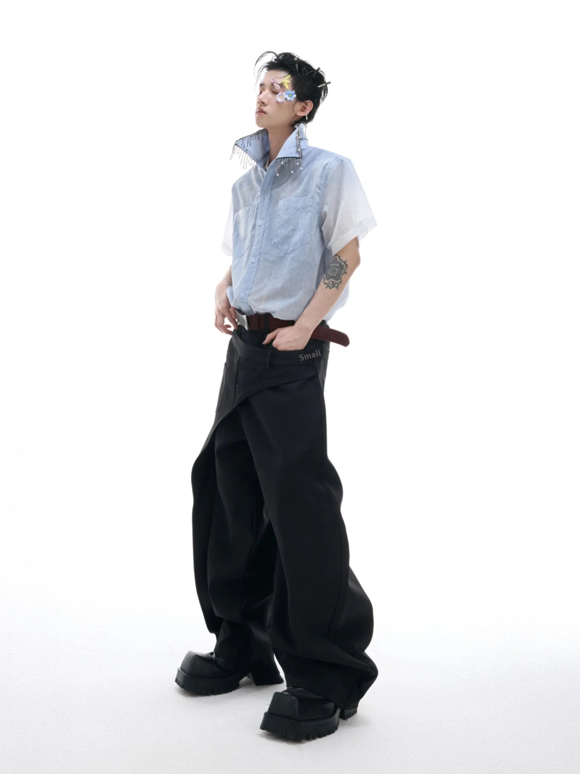 Blue loose fit short sleeve casual shirt on a hanger.