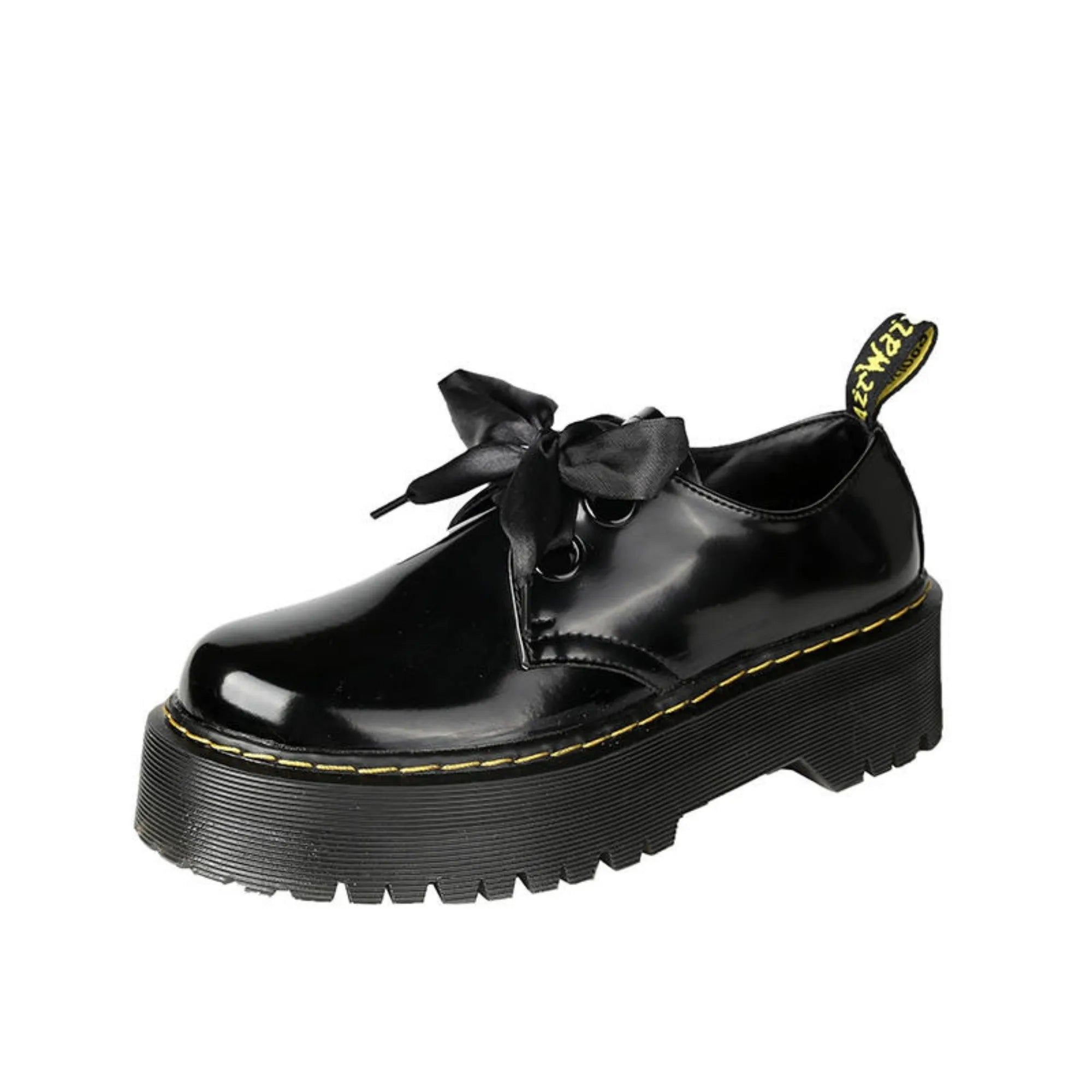 Black women's thick-soled lace-up shoes with decorative white ribbon cross straps.