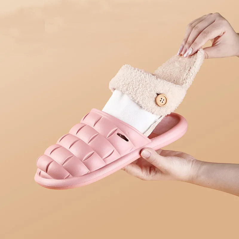 Plaid detachable EVA slippers with plush lining in pink, shown on a foot.