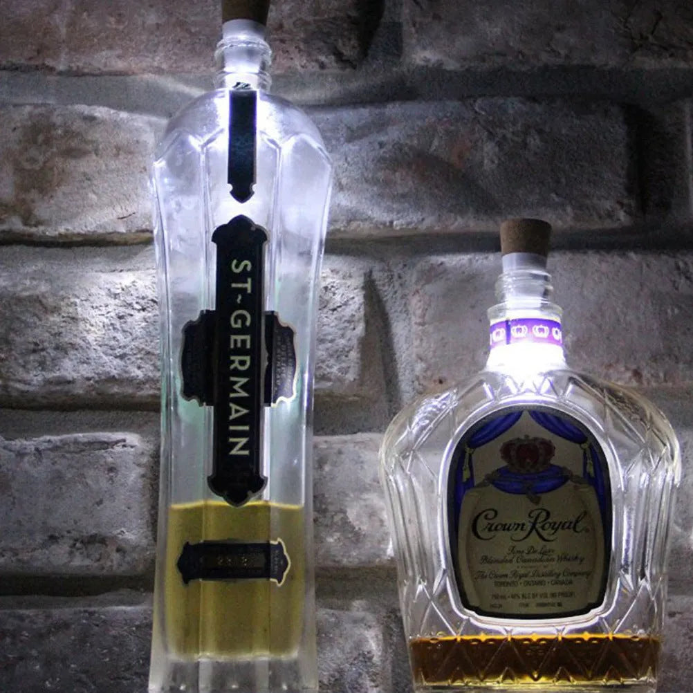 White plastic LED bottle cap light with 15 LEDs, shown on a glass bottle neck.