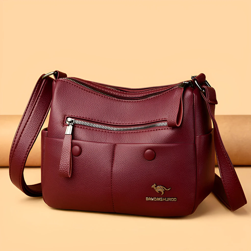 Soft PU leather women's crossbody shoulder bag in horizontal square shape with multiple internal pockets