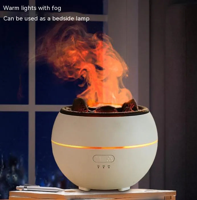 White and black ultrasonic aroma diffuser humidifier with round design and mechanical controls on a desk.