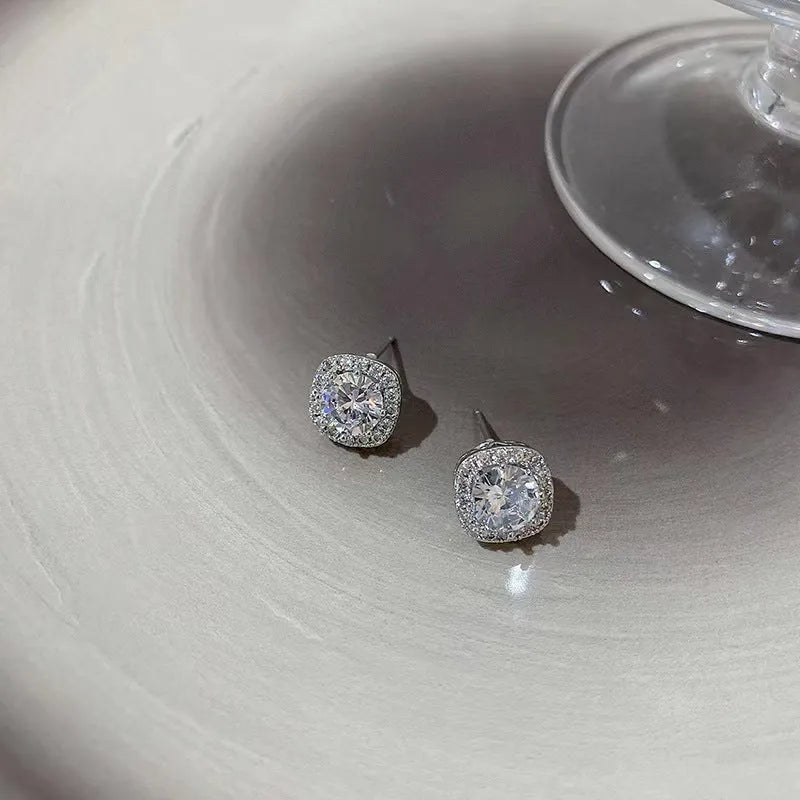 A pair of square geometric diamond-treated alloy earrings in a choice of silver or gold colour.