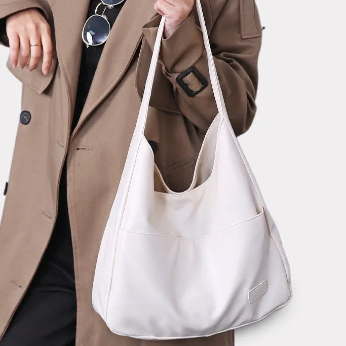 Women's soft PU leather shoulder bag in retro style with 32cm dimensions and open pocket design