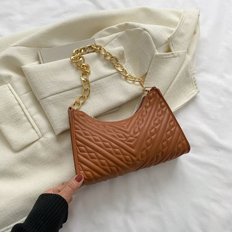 Brown pleated chain shoulder bag with square shape and adjustable metal strap