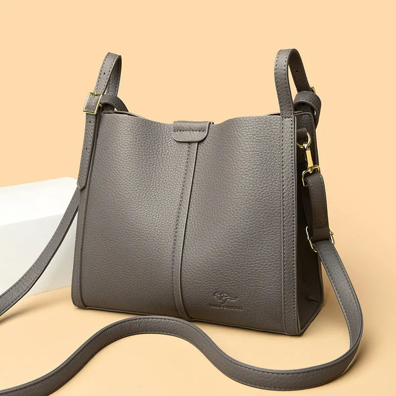 Retro-style ladies shoulder bag in soft PU material with internal organisers and single strap