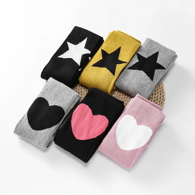 Girl's cotton leggings with five-pointed star and heart patterns in solid colour design