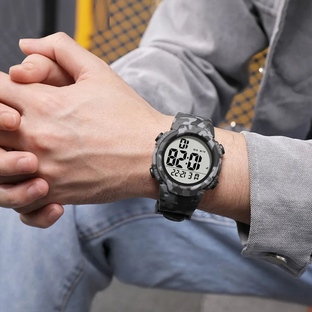 Waterproof male student sports electronic watch with 47.42mm digital dial, plastic band, and stainless steel buckle