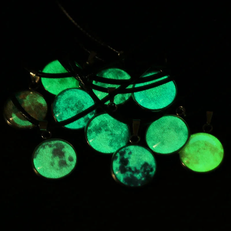 Luminous Christmas moon and starry night sky pendant necklace on a chain with extension.