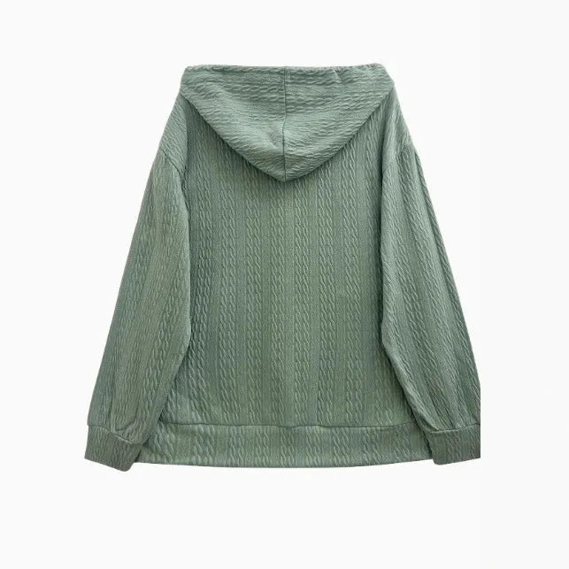 Green women's hooded zip-up sweater coat with a front zipper, shown in a loose, casual fit.