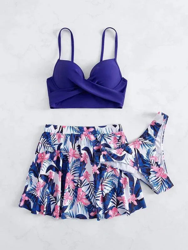Women's high-waist bikini three-piece swimsuit in polyester fabric showing belly coverage design
