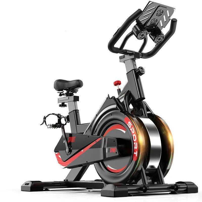 Black upright spinning bike with steel frame and console display for home cardio cycling