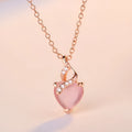 Women's heart-shaped pink crystal pendant necklace with rose gold cross chain