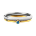 A geometric titanium steel ring featuring a December birthstone engraving.