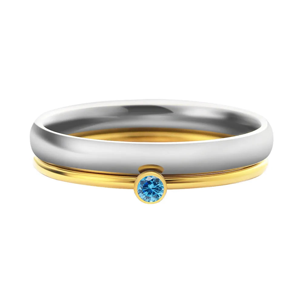 A geometric titanium steel ring featuring a December birthstone engraving.