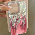 Silicone iPhone case with blue flame pattern design showing all-inclusive edge protection