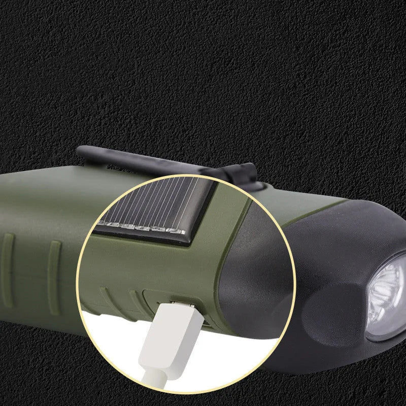 Hand-crank and solar-powered olive green LED emergency flashlight with USB charging port