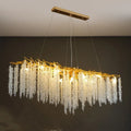 Aluminium alloy crystal chandelier light with adjustable height in round or long styles.